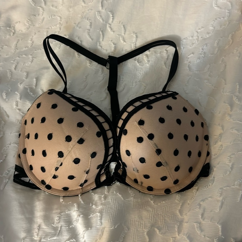 Victoria’s Secret 34D tan and black polka dot padded T back push up bra.